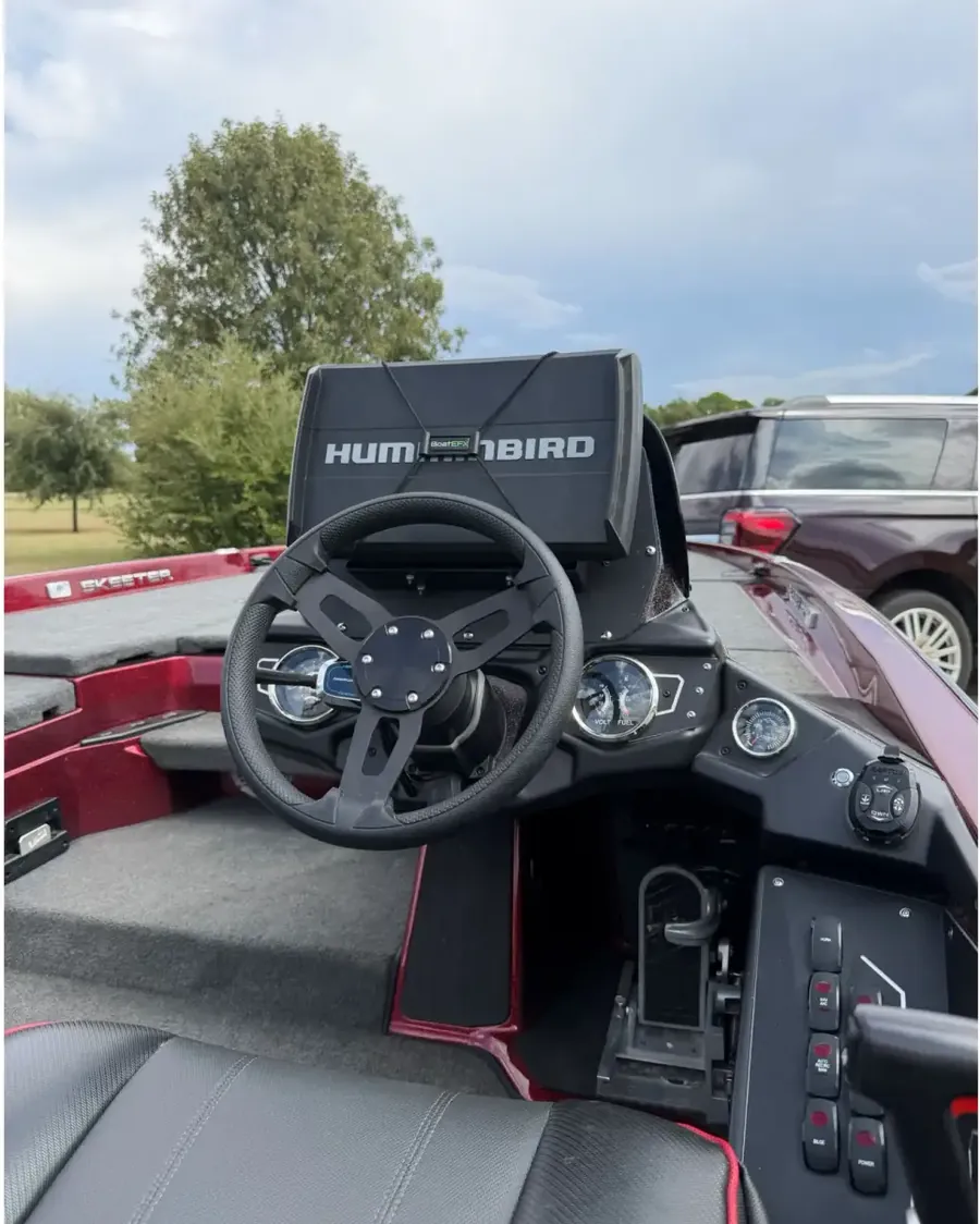 Humminbird graph mounted above the steering wheel at the console of a Skeeter bass boat