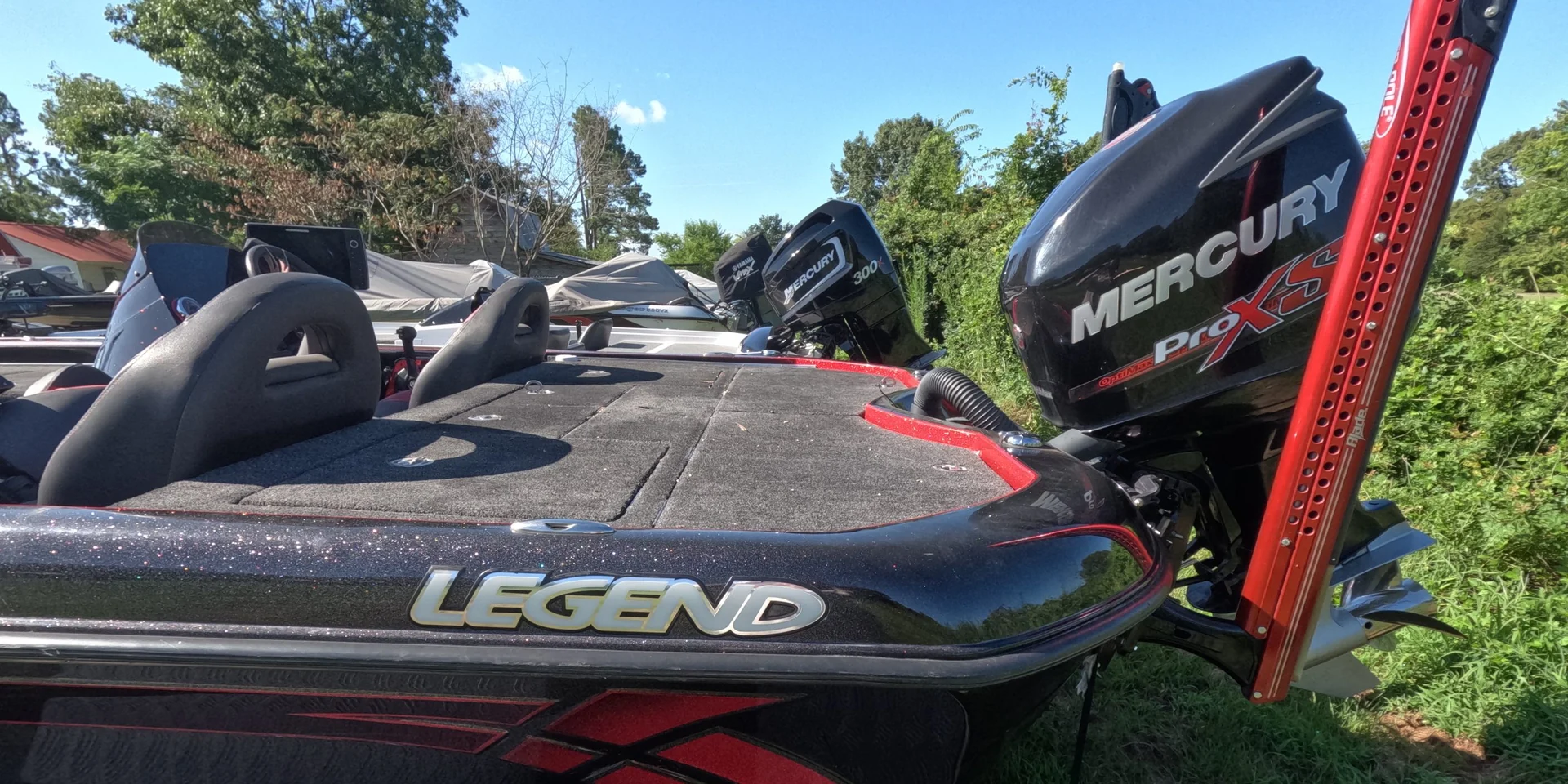 Mercury Pro XS outboard on the back of a Legend bass boat at Sartin Marine
