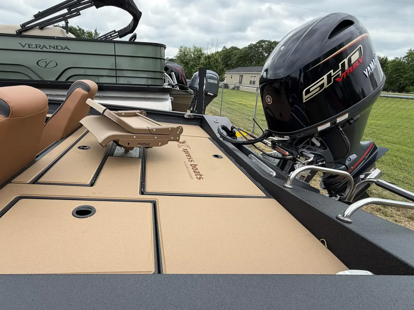 Yamaha SHO outboard on the back of an Xpress bass boat on the Sartin Marine lot